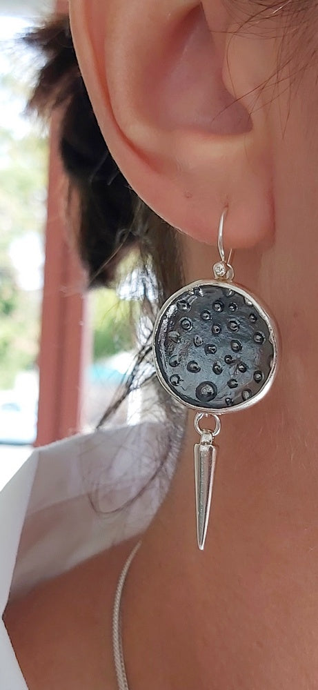 Silver orbit dangling earrings