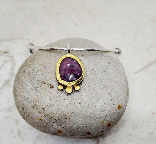 Sapphire pendant in 22k bezel and silver