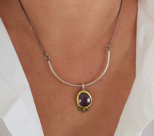 Sapphire pendant in 22k bezel and silver