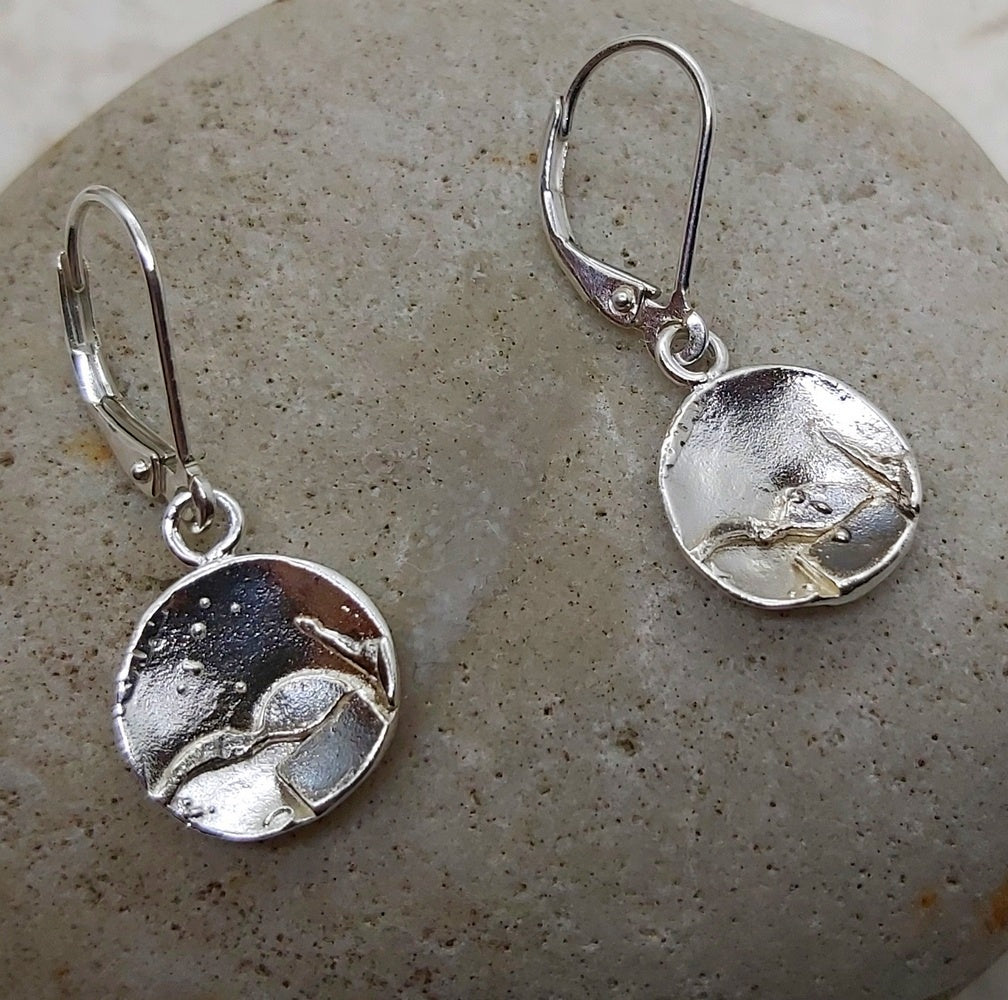 Light weight reticulated sterling silver earrings on lever back.