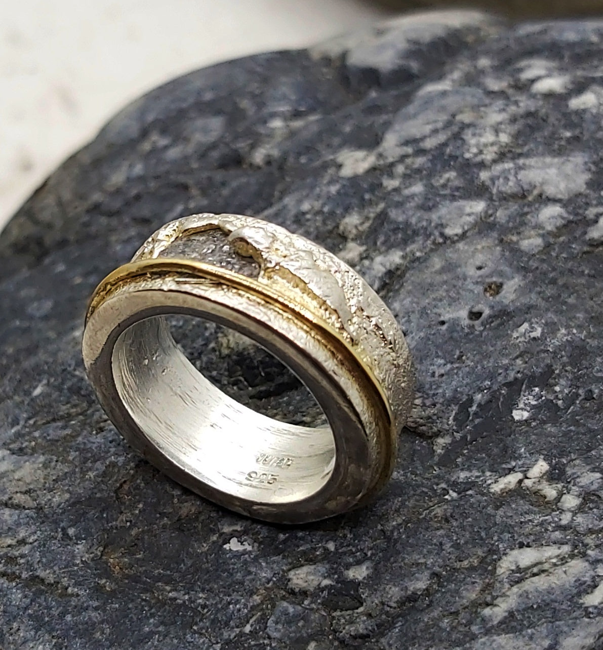 Raw gray diamond sand cast in silver