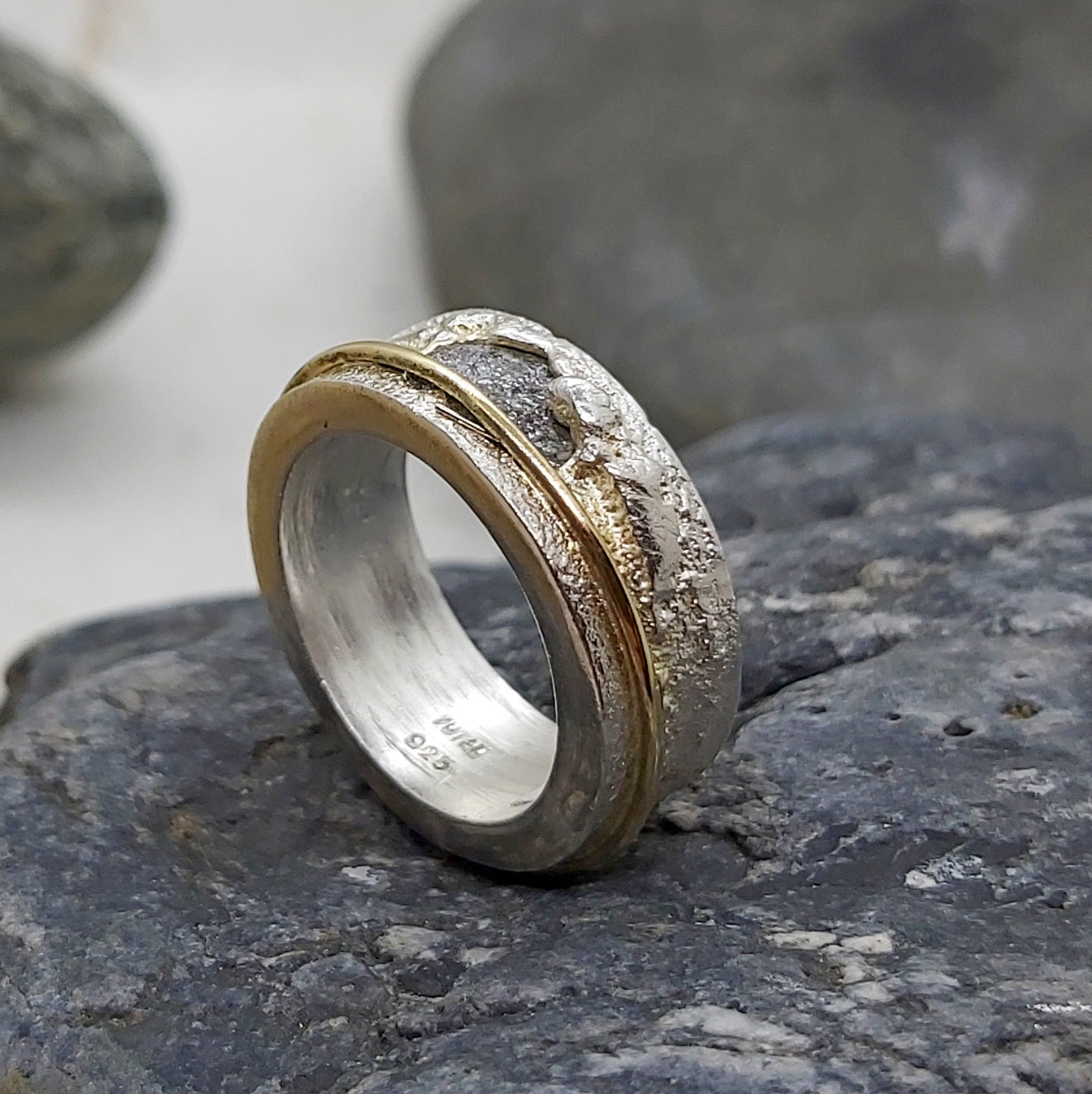 Raw gray diamond sand cast in silver