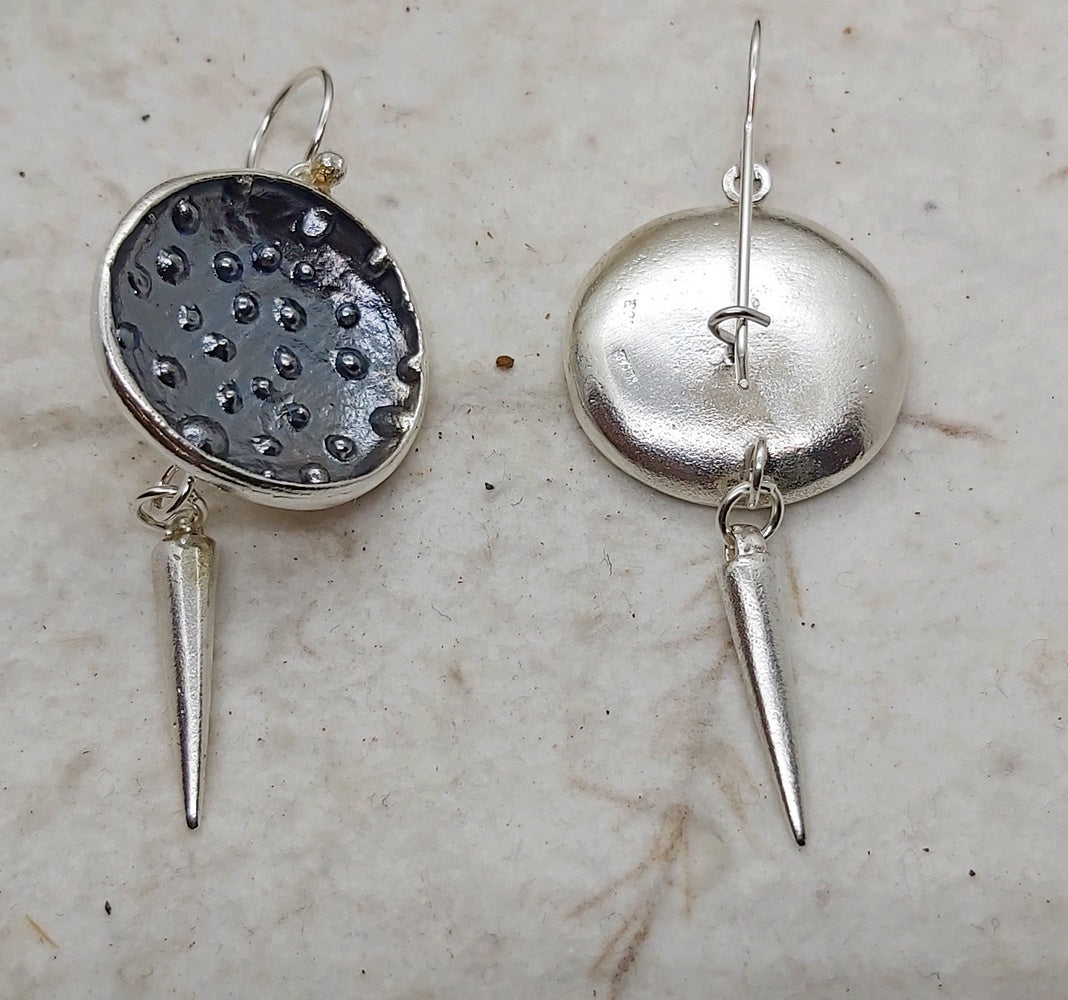 Silver orbit dangling earrings