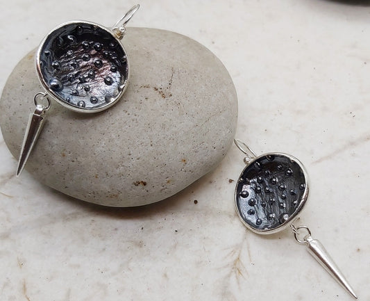 Silver orbit dangling earrings
