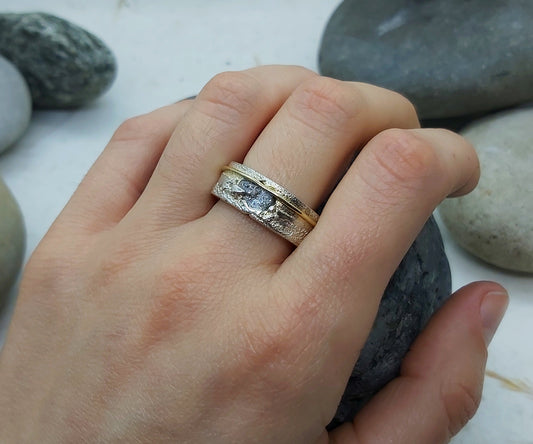 Raw gray diamond sand cast in silver