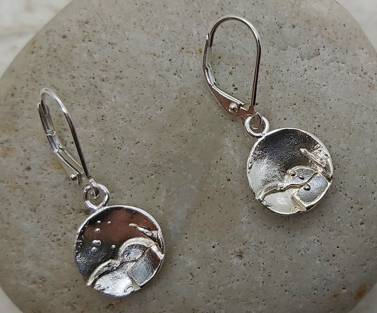 Light weight reticulated sterling silver earrings on lever back.